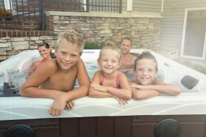 hot tub maintenance is easy with family help