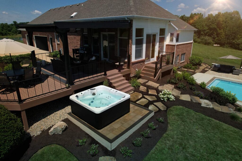 backyard with pool and hot tub