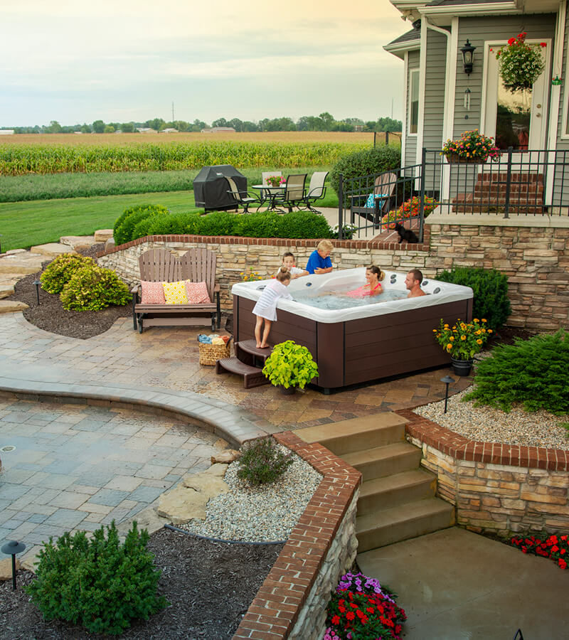 Family Hot Tub. Create a space to hang out and enjoy time with a family with a MasterSpas hot tub.