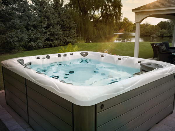 feel at home in your backyard paradise with a master spas hot tub
